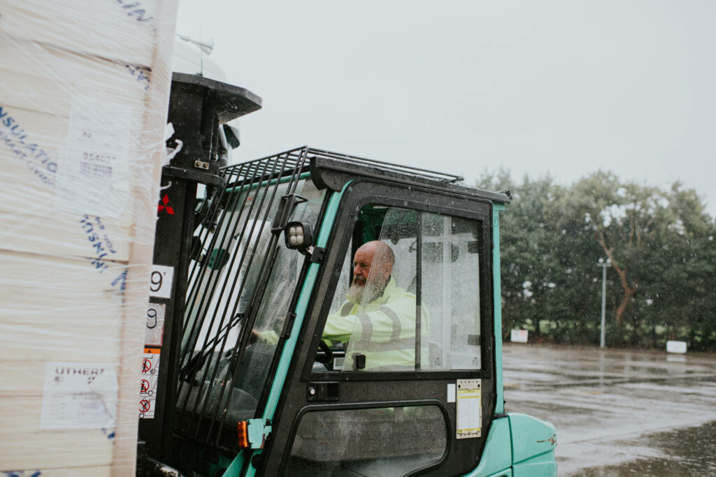 Image of Unilin Insulation worker using forklift to transport our insulation